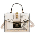 Fashion snake pattern handbag See size chart under “more details”