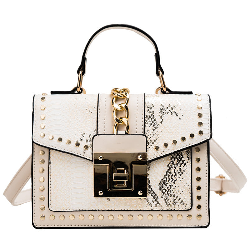 Fashion snake pattern handbag See size chart under “more details”