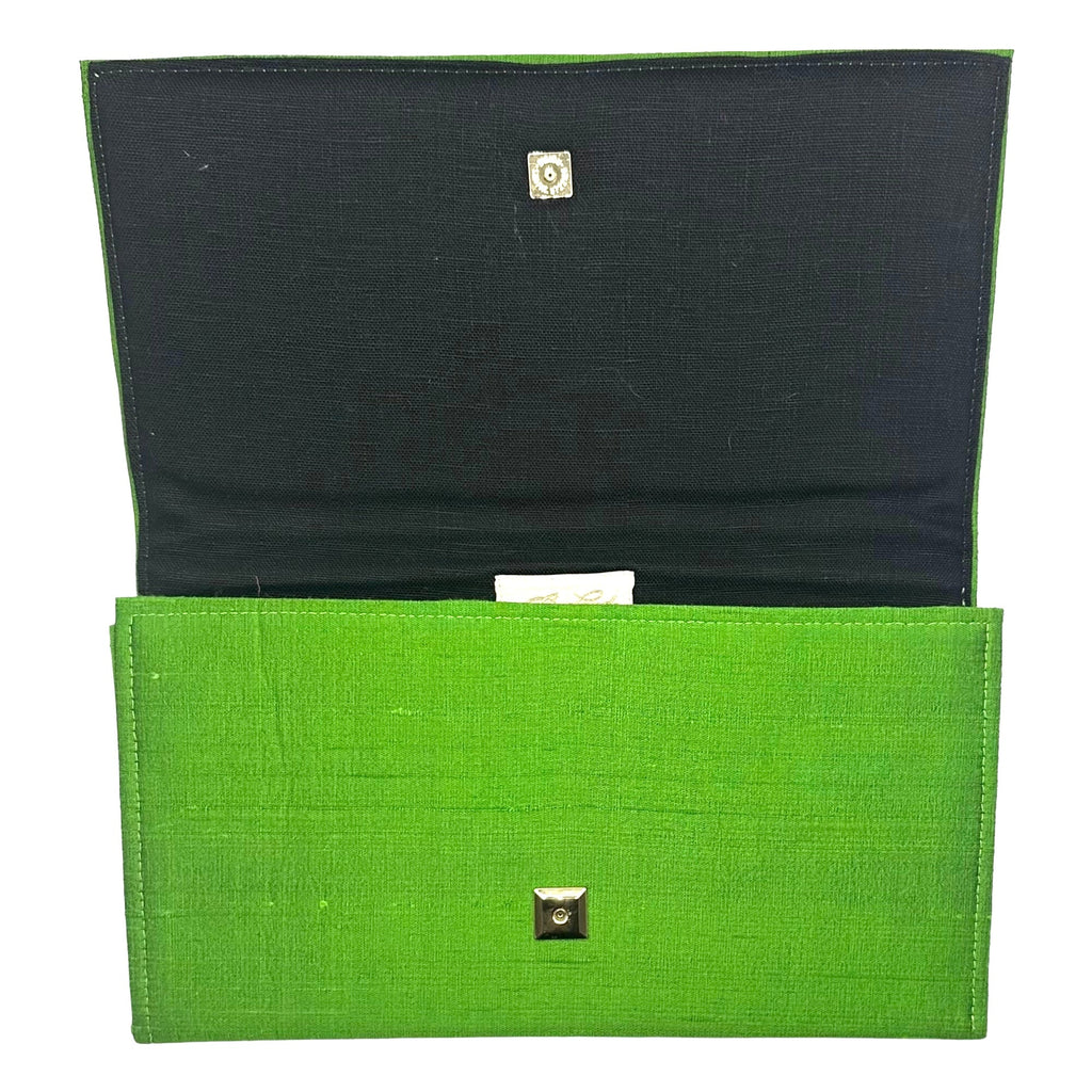 Jess Clutch See size chart under “more details”