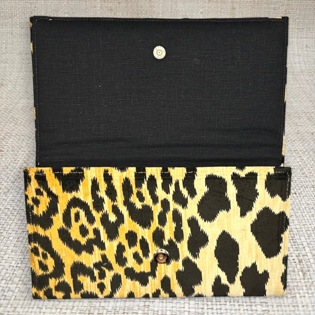 Ashley Clutch See size chart under “more details”