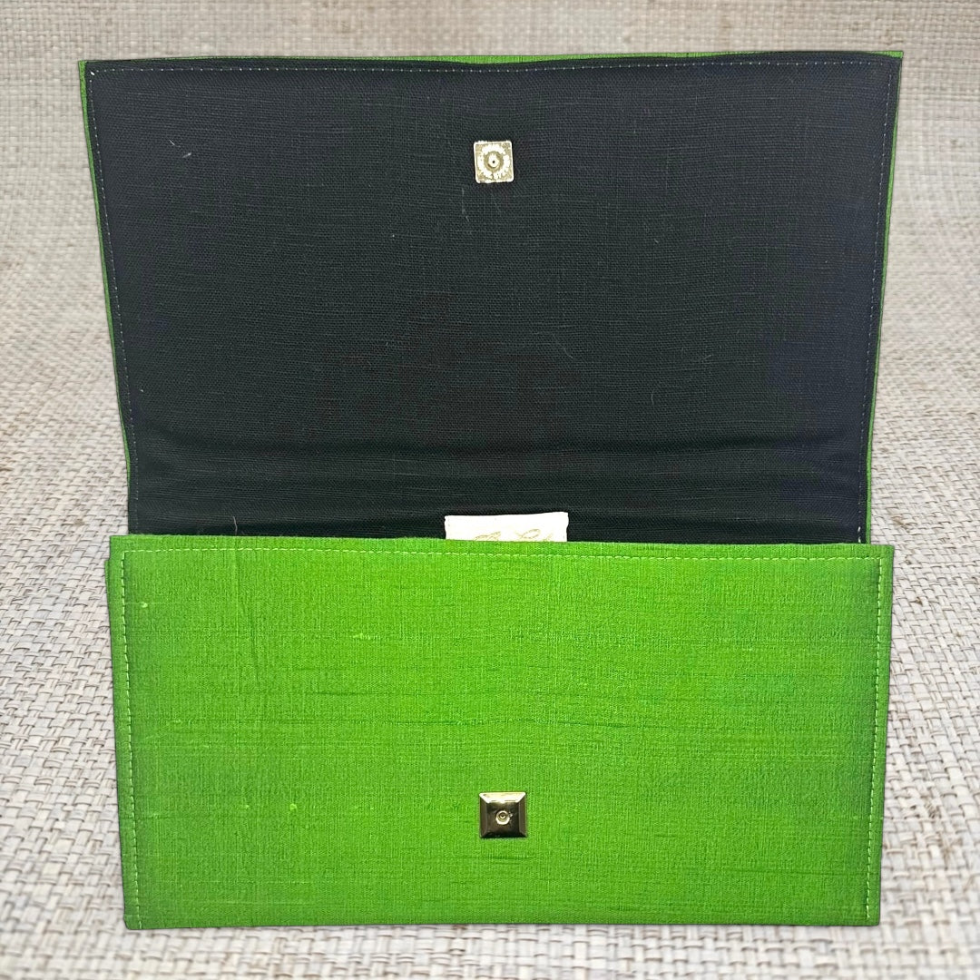 Jess Clutch See size chart under “more details”